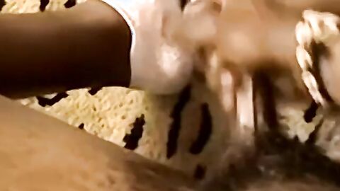 Black amateur strips and masturbates into an intense orgasm