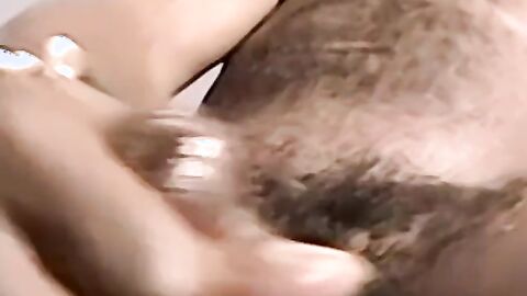 Black amateur strips and masturbates into an intense orgasm