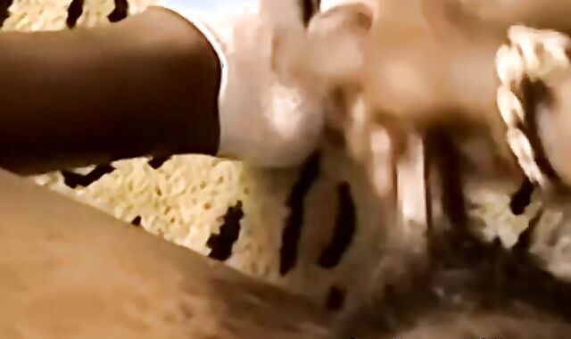 Black amateur strips and masturbates into an intense orgasm