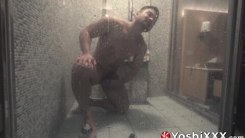 Hunky hairy Japanese lad Rio douches his hole in a glass shower with a massive dildo