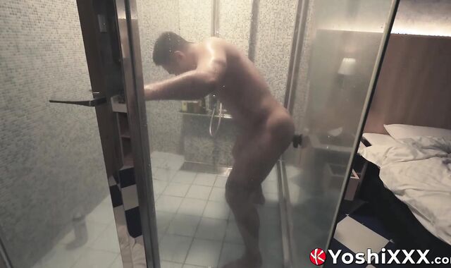 Hunky hairy Japanese lad Rio douches his hole in a glass shower with a massive dildo