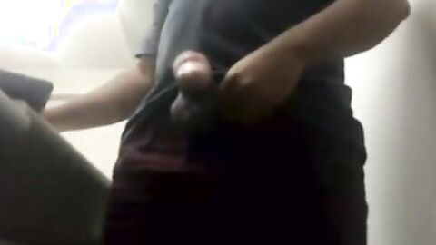 Brazilian Daddy Strokes His Big Uncut Cock at Work