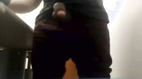 Brazilian Daddy Strokes His Big Uncut Cock at Work