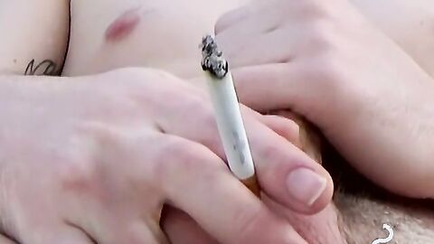 Tattooed twinks blowing clouds of smoke to his dick