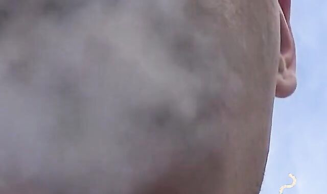 Tattooed twinks blowing clouds of smoke to his dick