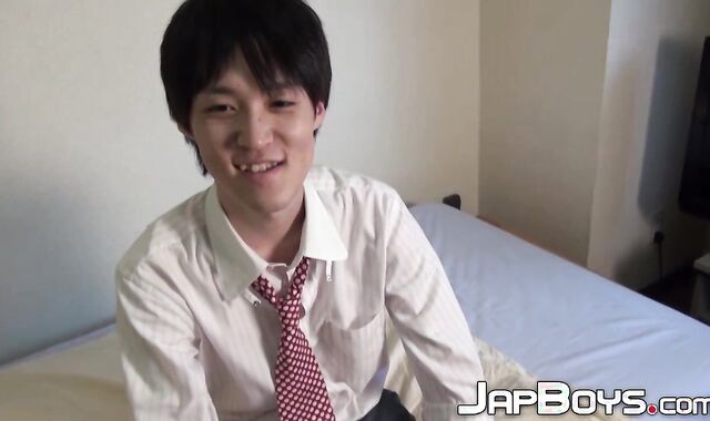 Japanese twink pulls his throbbing dick out to masturbate