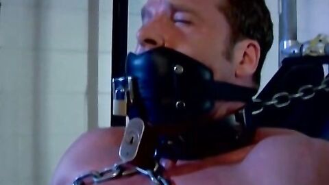 Hunky man Derek Pain is restrained to be tormented on his nipples