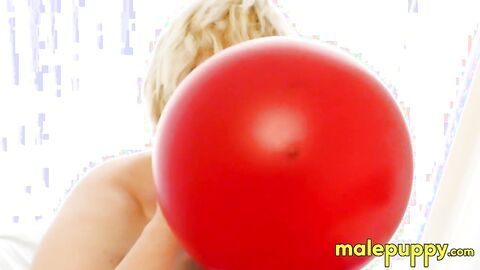 Elix Ataxx rubs the balloon over his body while rubbing dick around his playmates