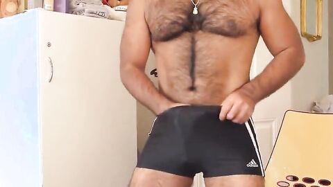 Hairy Asian Guy Strokes His Big Cock