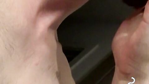 Tattooed skinny dude smoking and shooting cum on the floor