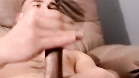 Young amateur jerks off his hairy cock and cums on camera