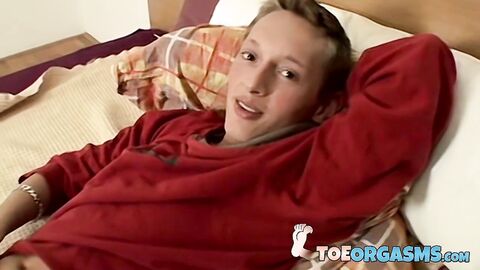 European Veso puts on an amazing foot show before masturbating his uncut cock