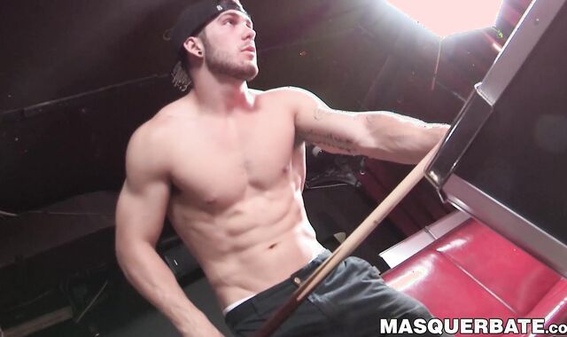 Attractive jock plays pool before stroking his big hard cock