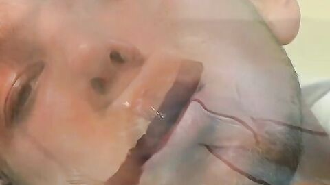 Gorgeous Christian Taylor stroking and smoking in the tub
