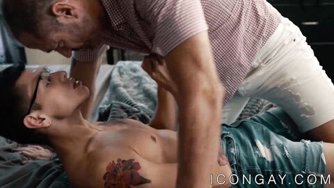 Young Latino twink rides a huge mature gay and moans