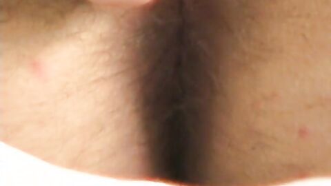 Hottie Cody lights his red cig while stroking his pinkish cock