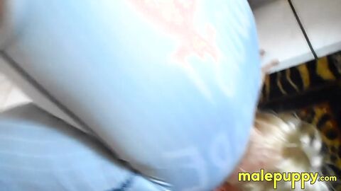 Elis Ataxx sits while squirming and smothering the face of the twink Leo Blue