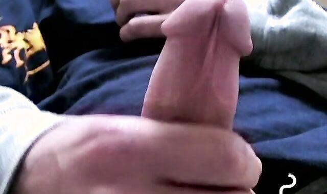 Twink savors the pleasure of smoking and stroking cock