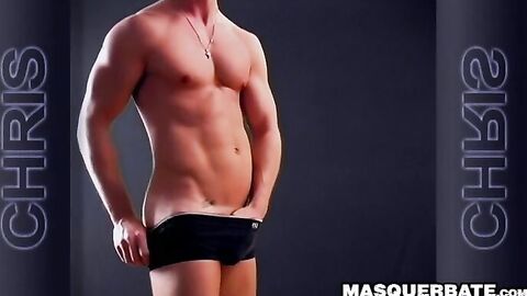 Handsome muscular guy Chris does striptease while jerking