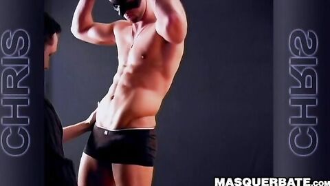 Handsome muscular guy Chris does striptease while jerking