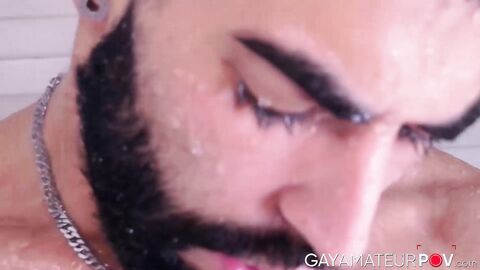 Inked muscular Yah Jil soaps up his muscular body and plays his long uncut thick dick