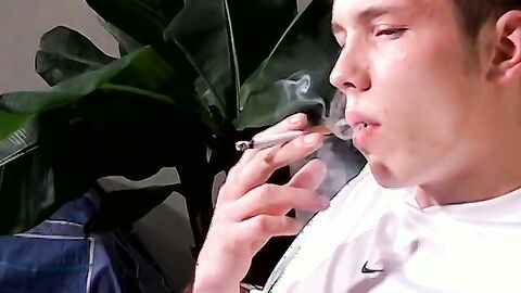Teen hardcore smoker Denis strokes gorgeous cock on the couch