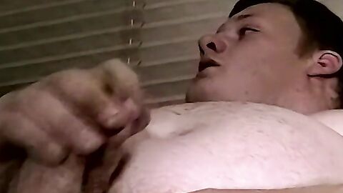 Chubby guy jerks off and makes his dick hard