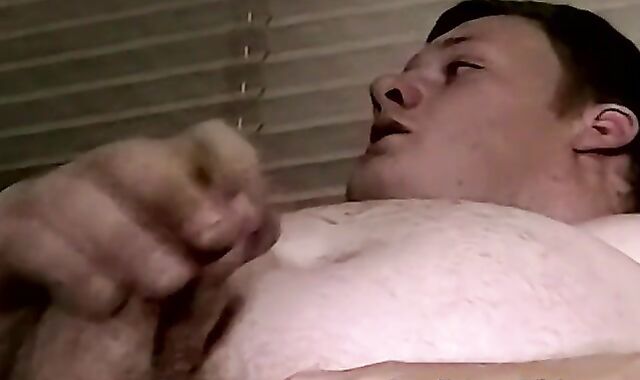 Chubby guy jerks off and makes his dick hard