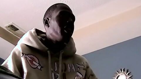 Ebony amateur watches porn and tugs on his big black cock