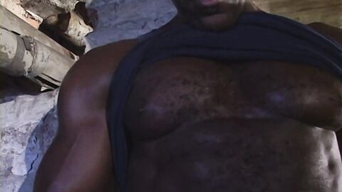 The big black dude jerks off in his secret haven at home the basement