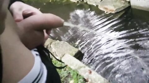 Pissing Outdoors with a Big Cock Twink