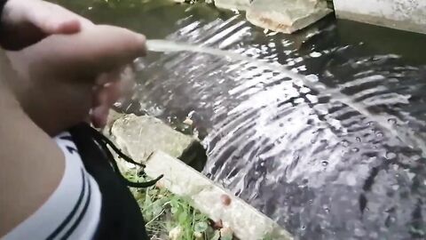 Pissing Outdoors with a Big Cock Twink