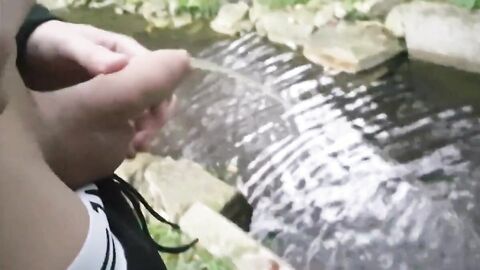 Pissing Outdoors with a Big Cock Twink