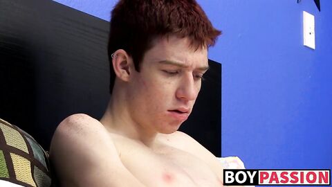 Cutie jerks off on the bed with a big dildo deep inside him