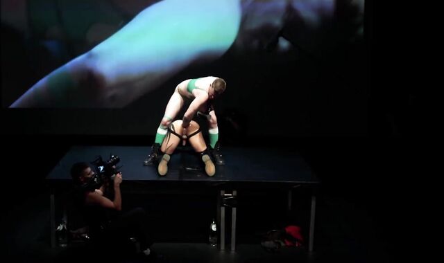 Axel Abysse and Yoshi Kawasaki take the stage for a live sex show in an unusual venue