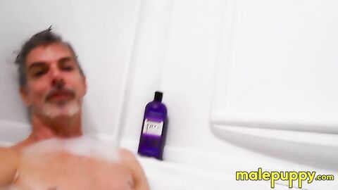 Giant Daddy Richard Leonox teases you with how he strokes his huge cock in the tub