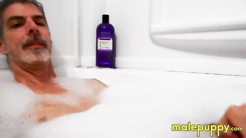Giant Daddy Richard Leonox teases you with how he strokes his huge cock in the tub