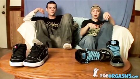 Hot boys Cain and Blinx start a foot fun before enjoying a shared wank off