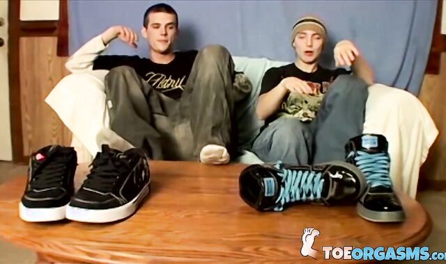 Hot boys Cain and Blinx start a foot fun before enjoying a shared wank off
