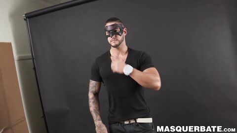 Muscular masked hunk jerks off his big erect cock solo