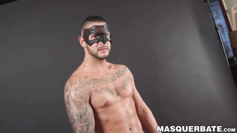 Muscular masked hunk jerks off his big erect cock solo