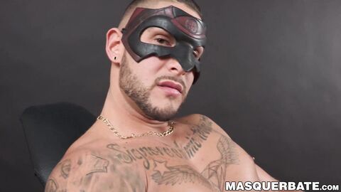 Muscular masked hunk jerks off his big erect cock solo