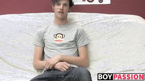 Adorable gay guy Danny jerks off his dick on couch solo