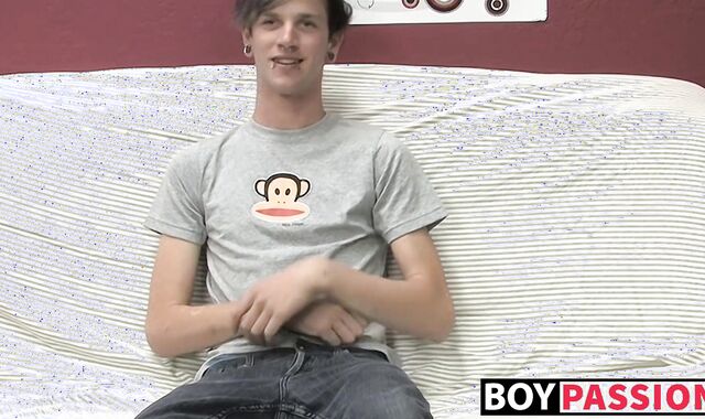 Adorable gay guy Danny jerks off his dick on couch solo