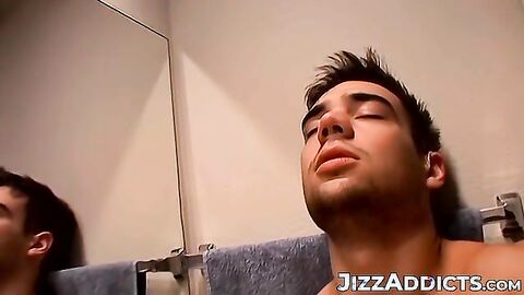 Horny Zack Randall strips off in the bathroom before rubbing his cock