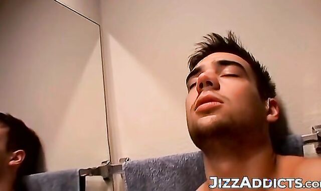 Horny Zack Randall strips off in the bathroom before rubbing his cock