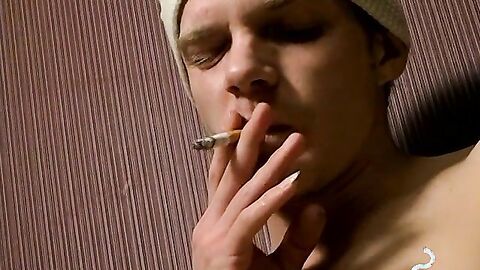 Sexy Leo smoking butts then proceeds on cockstroking