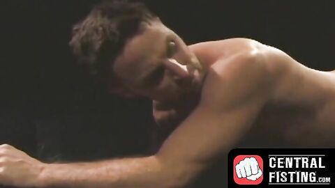 CentralFisting.com - Kinky gay strokes his cock while enduring a hardcore fist fuckin