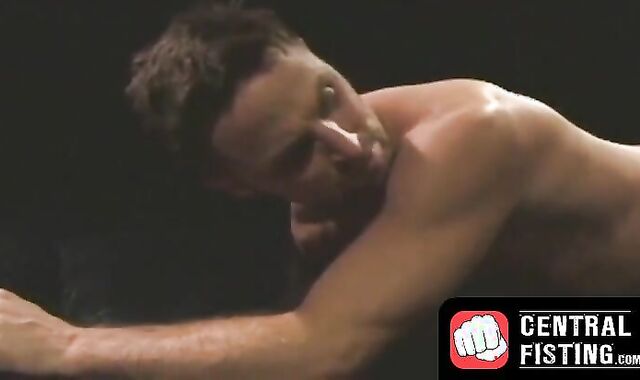 CentralFisting.com - Kinky gay strokes his cock while enduring a hardcore fist fuckin