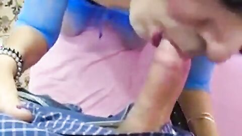 Crossdresser Deepthroats a Big Cock